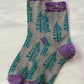 TABBISOCKS brand Replant Pairs Tree Socks in Grey with a purple insert at the cuff and toe and a green overall tree design