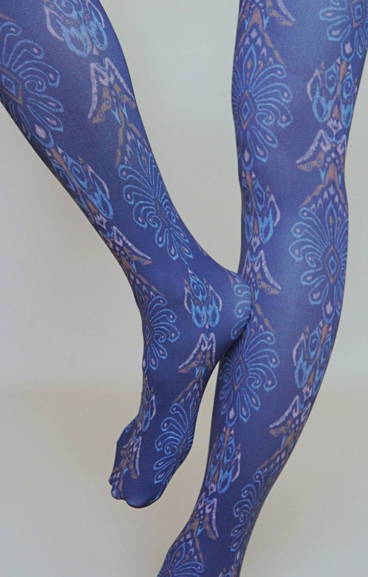 Blue patterned tights on a white background