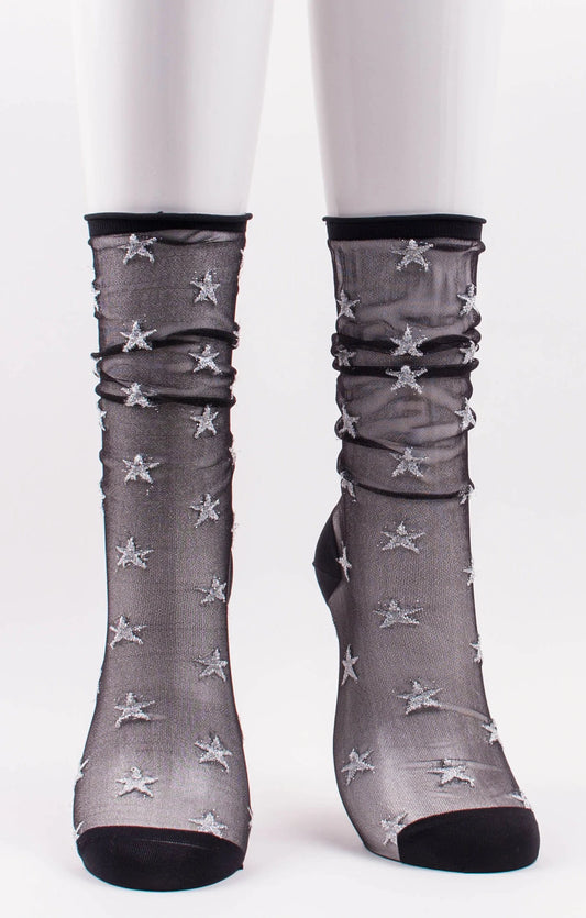 TABBISOCKS brand Sheer Star Tulle Socks in BLACK SILVER color with silver-colored embroidered stars scattered on transparent black fabric.