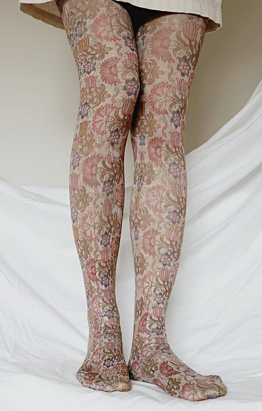 Girl is wearing 17th-century art work printed on tights.