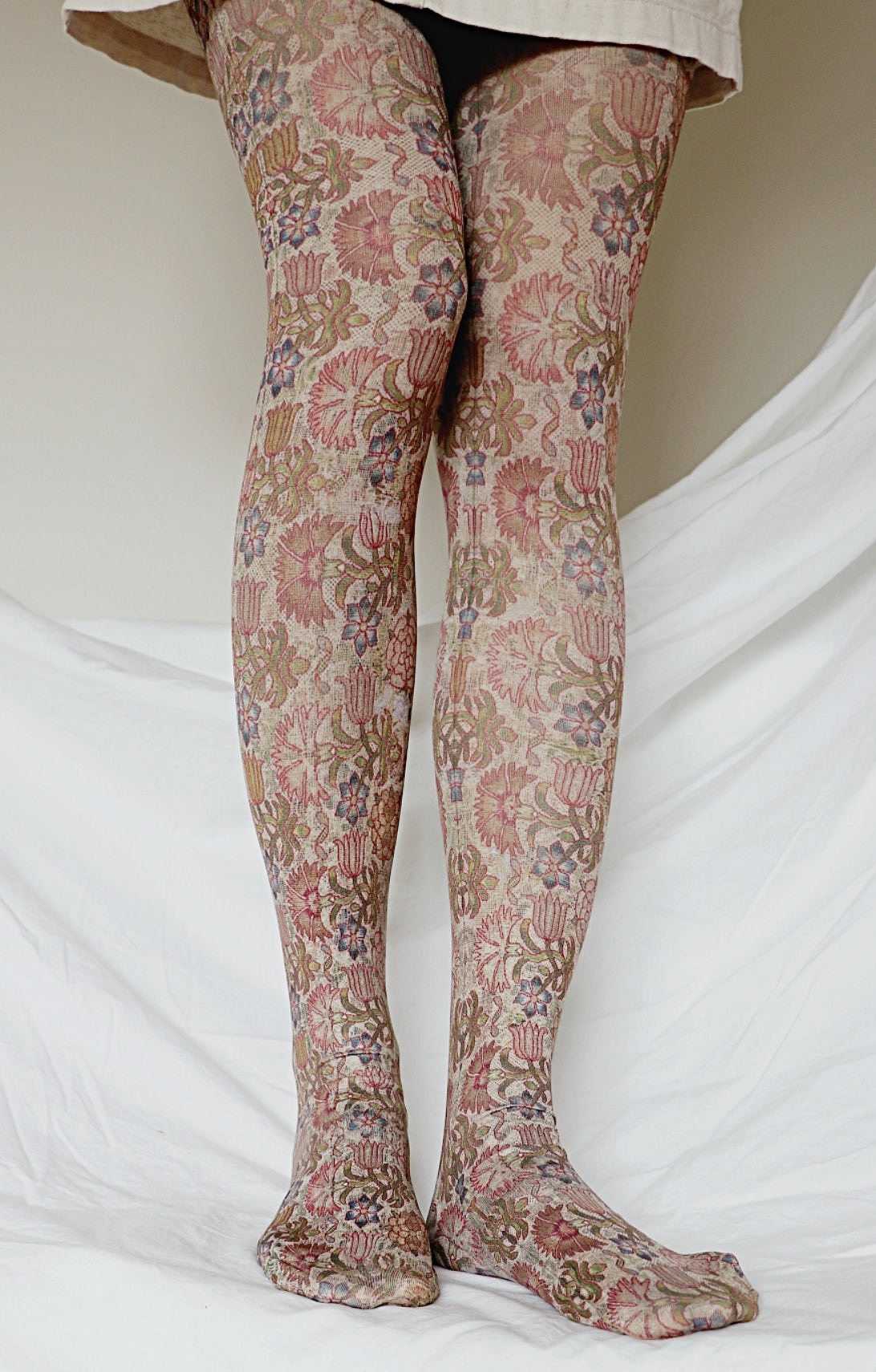 TABBISOCKS brand The Art Institute of Chicago Printed Tights, reddish brownish overall in color.