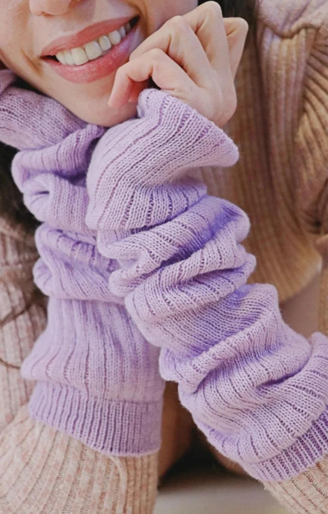 Woman's arm with ivory sweater wearing Lavender color of TABBISOCKS brand Wool Blend Leg and Arm Warmers
