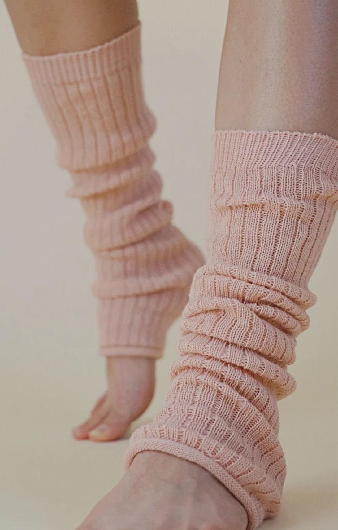 Woman's leg wearing Pink color with TABBISOCKS brand Wool Blend Leg and Arm Warmers