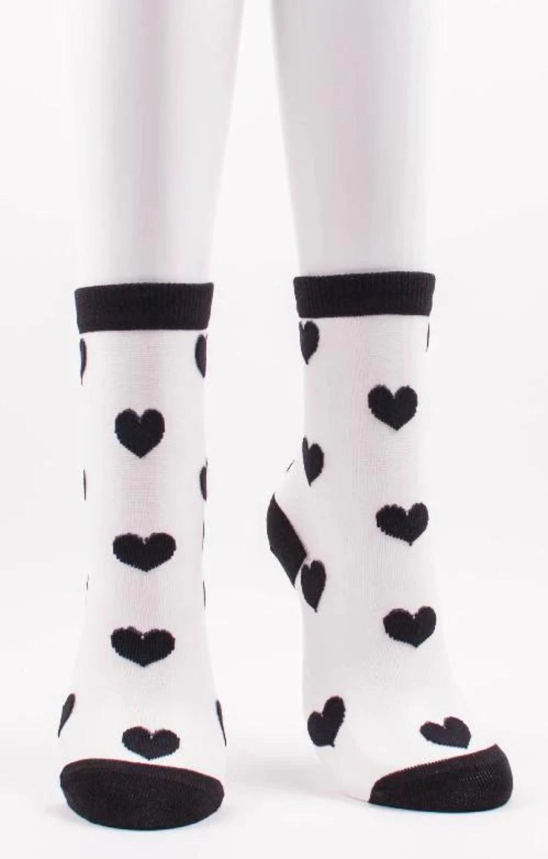 TABBISOCKS brand Black Heart Sheer Socks in BLACK color with black heart pattern all over the transparent transparent fabric