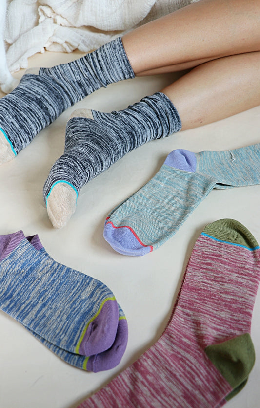 All colors of a product called Heather Organic Cotton of the TABBISOCKS brand