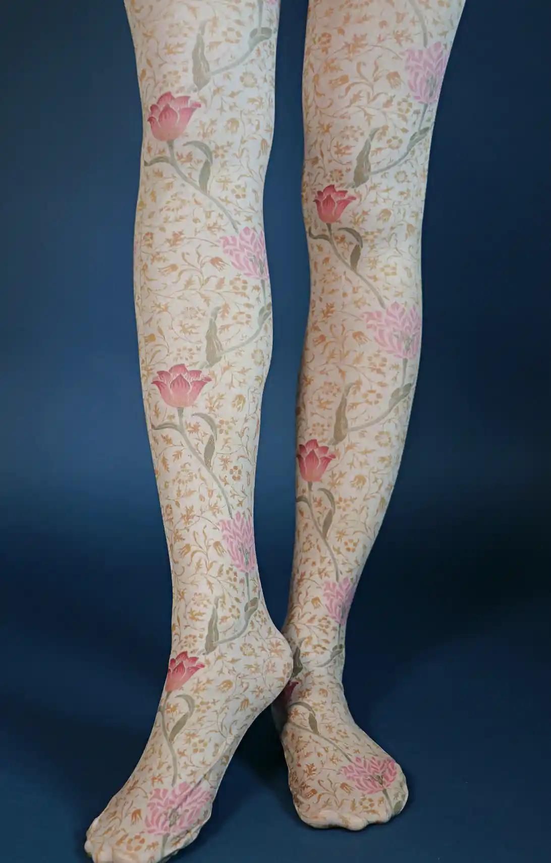 A product called Beige Medway from the William Morris collection of the TABBISOCKS brand, with an antique color pink and red flower pattern, yellowish beige in color overall