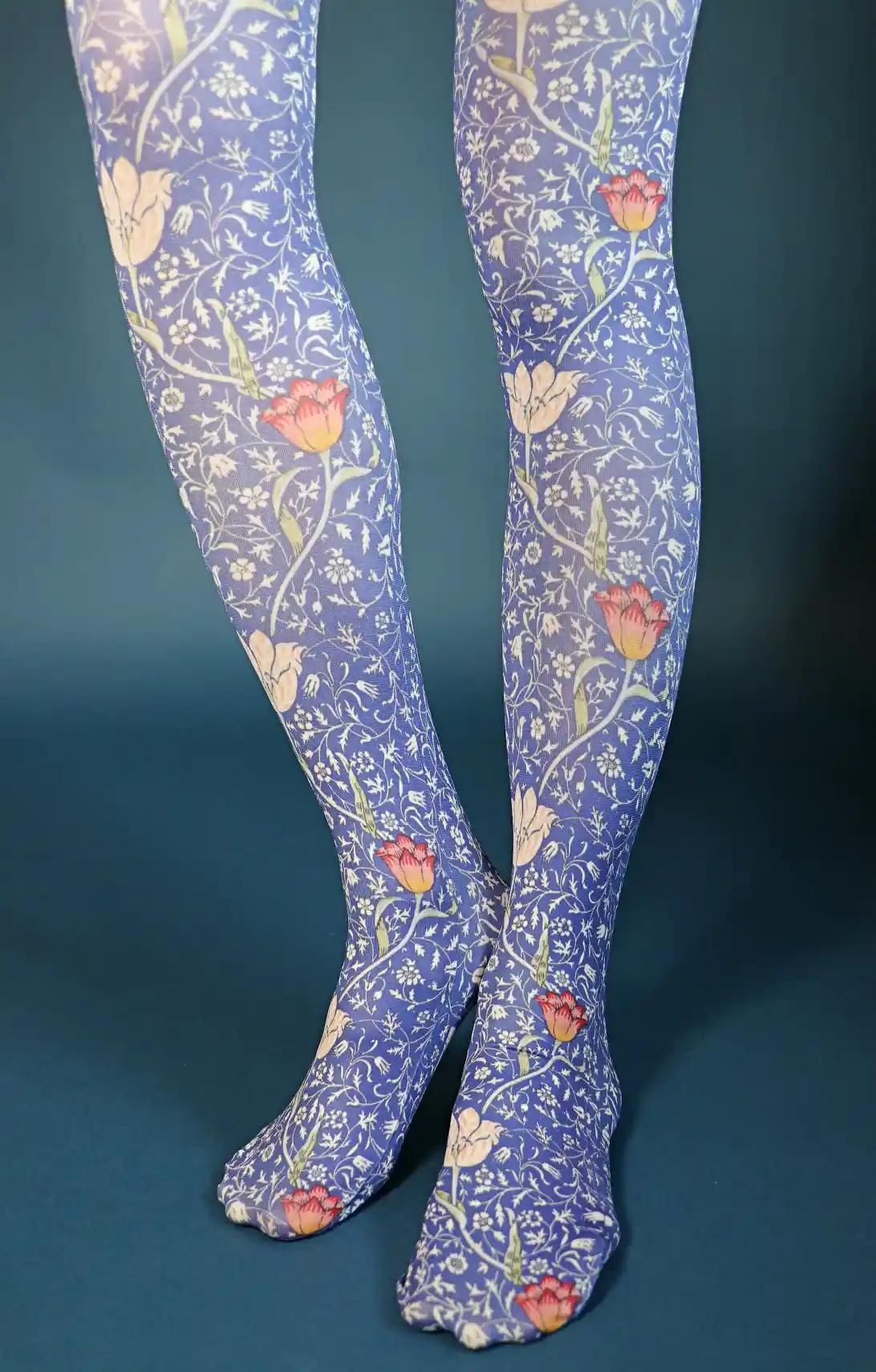 Blue Medway from the William Morris collection of the TABBISOCKS brand, with a pattern of antique colored pink and red flowers and white florals, and an overall bluish color