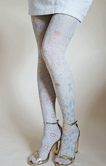 Double branch tights from the William Morris collection of the TABBISOCKS brand, with an overall floral illustrated design in an antique light blue color.