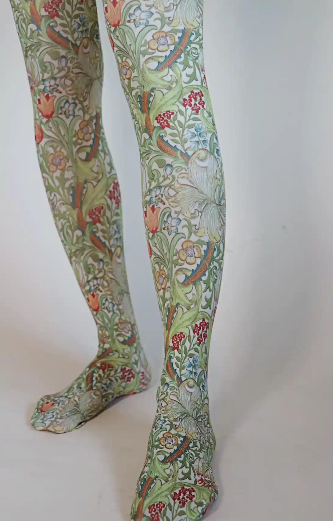 Green Golden Lily from the William Morris collection of the TABBISOCKS brand, with pink, red, floral and white flower patterns, and the overall color is green, the color of leaves